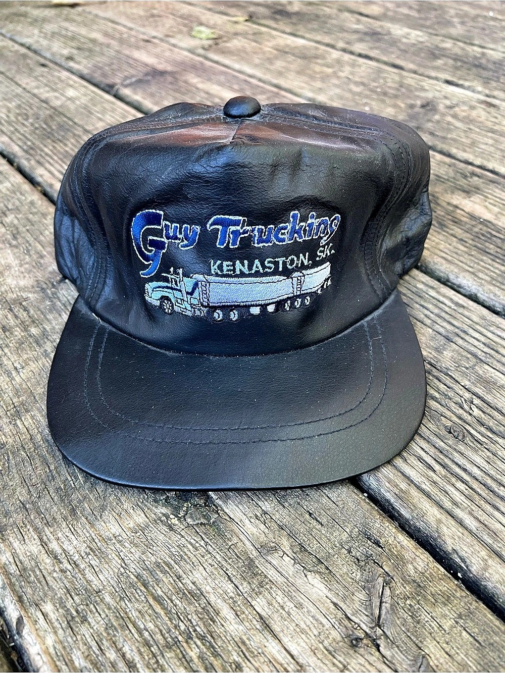 Guy Trucking Kenaston, SK Black Leather Trucker Hat